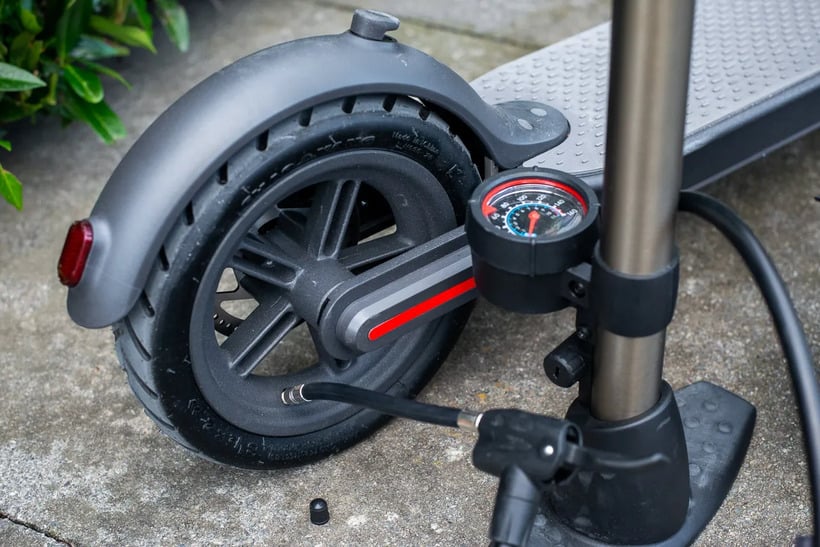 Electric Scooter Being Pumped Up