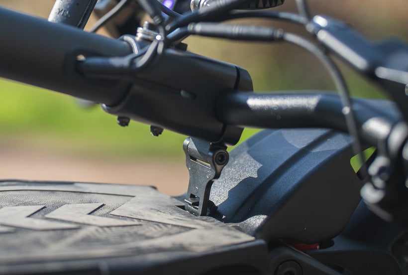 Mantis V2 Handlebar Latch Clipped into Deck Hook