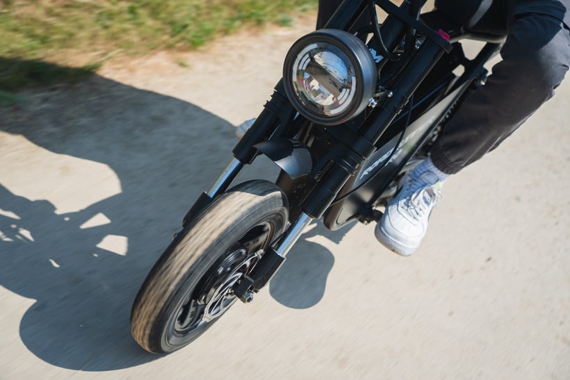 Dramatic Shot of the EMOVE RoadRunner Pro in Motion