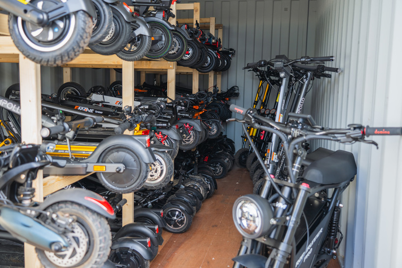 Electric Scooter Insider Storage Unit Full of Electric Scooters